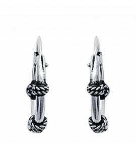 Woman silver creoles earring